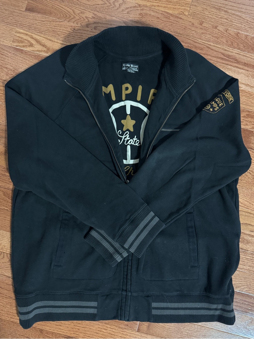 Lucky Brand Vintage Men's Black Zip-Up Jacket with Ribbed Collar and Stripe Trim